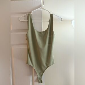 Express Green Bodysuit Sleek Minimalist Design